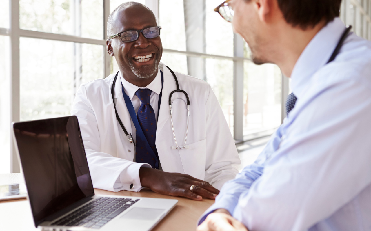 AI-powered monitoring system analyzing connected medical IoT devices in a hospital network to detect cybersecurity threats and ensure patient data protection.